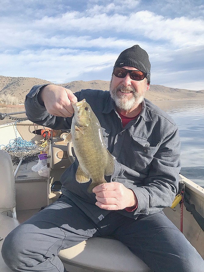 Reed Mitchell from Gardnerville with a smallmouth bass at Topaz Lake.