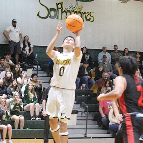 Battle Mountain’s Adan Nevarez goes up for a layup against Pershing County.