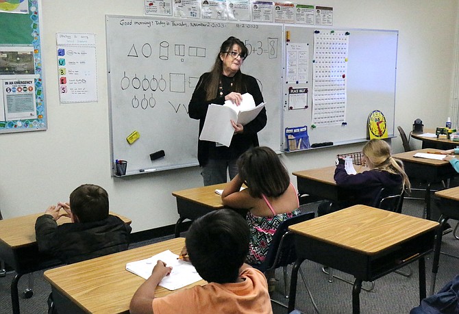 Fritsch Elementary School math interventionist Sohyla Fontaine teaches a second-grade class.