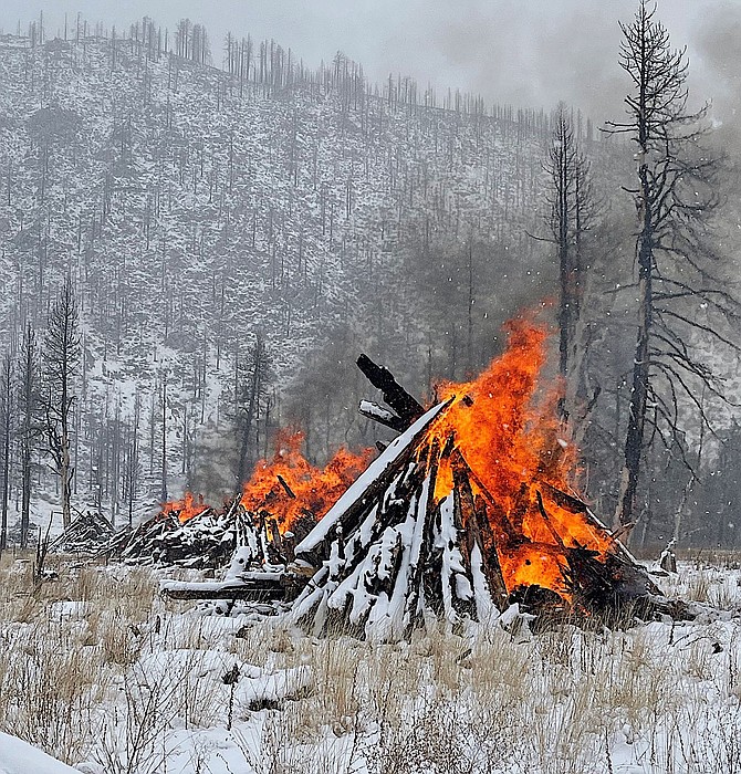 Alpine County hopes to wrap up pile burning in and around Pleasant Valley before the storm arrives on Saturday.