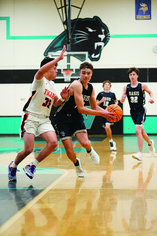 Oasis Academy’s Fenn Mackedon recorded a pair of double-doubles in last month’s holiday tournament in Reno.