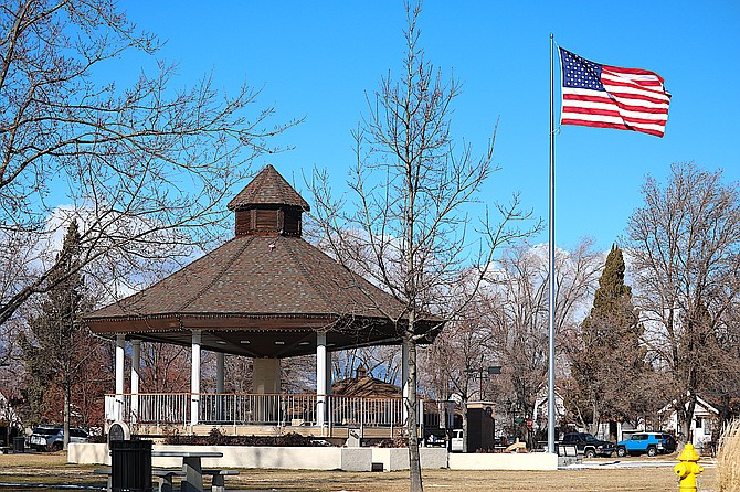 The big flag at Minden Park is lofted by Tuesday's winds.