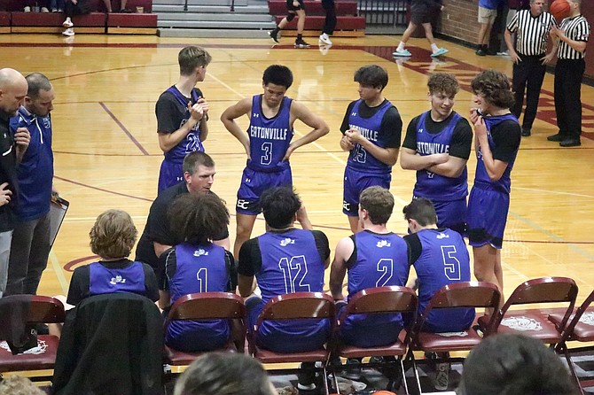 Eatonville coach TJ Cotterill gives instruction to his team during their game against Montesano.
