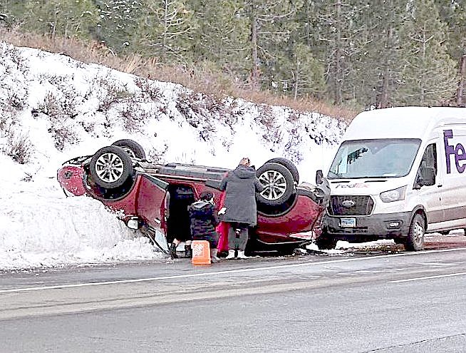 A vehicle overturned at Spooner summit Tuesday afternoon in a three car collision.
Photo special to the Tahoe Daily Tribune by Mayela Carver