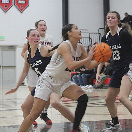 Yasmine McKinney shoots from the paint against the North Tahoe Lakers.