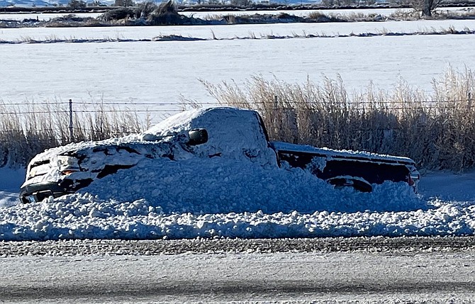 A pickup truck slid off U.S. Highway 50 near Harmon Junction.