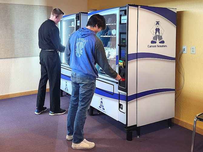Carson High School students retrieve food at lunch using the High Tech Center’s new vending machines.