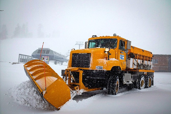Chris Howland drives a Nevada Department of Transportation snow plow during a blizzard on Mt. Rose Highway on Dec. 1, 2022.