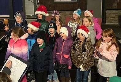 Symphony Youth Chorus singing at McFadden Plaza last December.