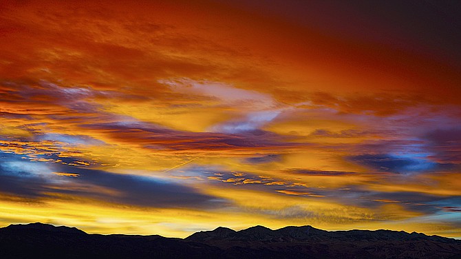 Sunrise over Topaz Ranch Estates was red and yellow this morning in this photo taken by John Flaherty