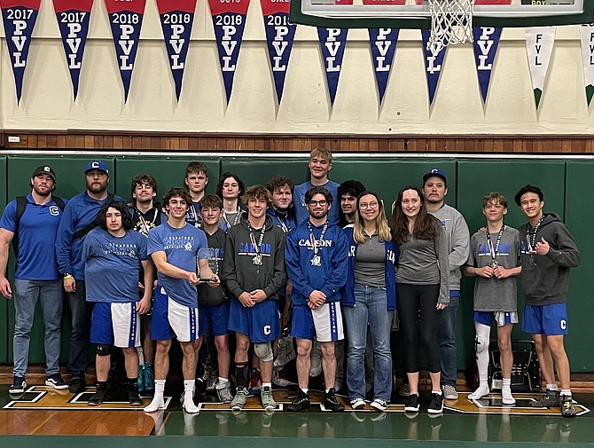 The Carson High School wrestling team poses for a photo with the second place trophy at the Placer Duals last weekend. The Senators went 4-1 before losing in the finals and had three undefeated wrestlers.