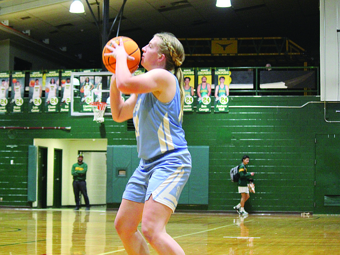 Oasis Academy’s Grace Laca gets set to shoot against Battle Mountain.