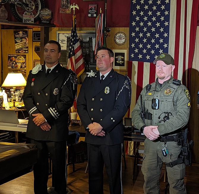 Left to right, Storey County Fire Capt. Daniel St. Clair, firefighter/paramedic Derek Giurlani and Storey County Sheriff’s Deputy Eli Kerr honored in Virginia City on Jan. 20.