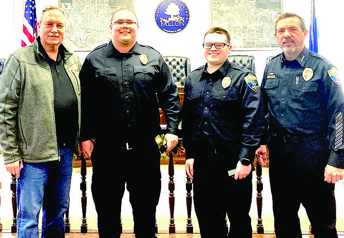 Officers Austin Moller and Michael Smiraglia took their oath of office on Jan. 2. From left are Mayor Ken Tedford, Moller, Smiraglia and Police Chief Ron Wegner.