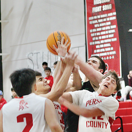 Travis Donaldson, Trenton Rhodes, Efrain Aceves and Michael Reitz go for a rebound against Incline on Saturday afternoon at PCHS.