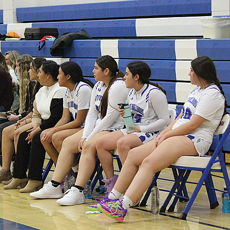 The McDermitt High School girls basketball team looks on during a home game earlier in the year. The Lady Bulldogs improved to 6-0 in the 1A East after road wins this past weekend against Jackpot and Wells.