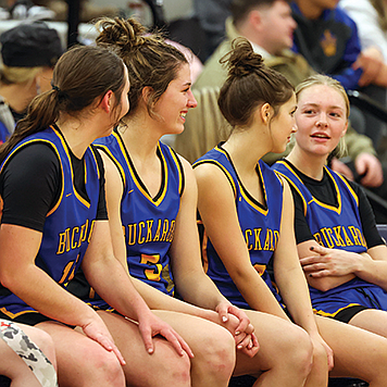 ANTHONY MORI • Elko Daily Free Press
Lowry’s Miranda Draper, Savannah Stoker, Autum Sanchez and Bryce Brinkerhoff enjoy a laugh on the bench during Thursday’s game in Spring Creek.