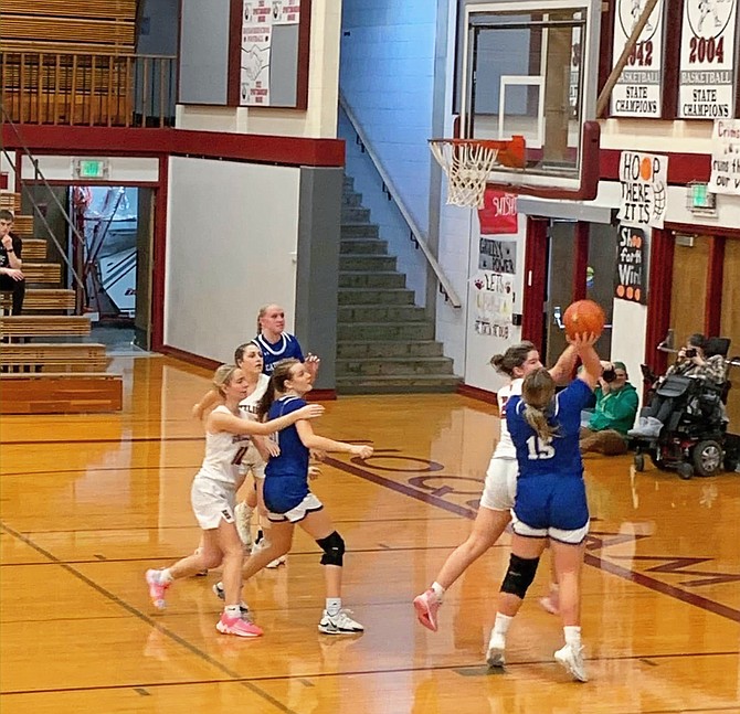 Eatonville's Sara Smith scores against Hoquiam in a game earlier this season. Smith's 12 points led the Cruisers in their loss against Montesano.