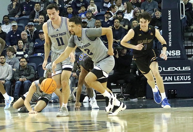 Nevada's Jarod Lucas (2) picks up a loose ball in the first half against San Jose State on Feb. 2, 2024 at Lawlor Events Center.