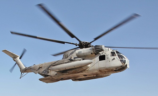 A CH-53E Super Stallion with the 22nd Marine Expeditionary Unit flies over the Red Sea.