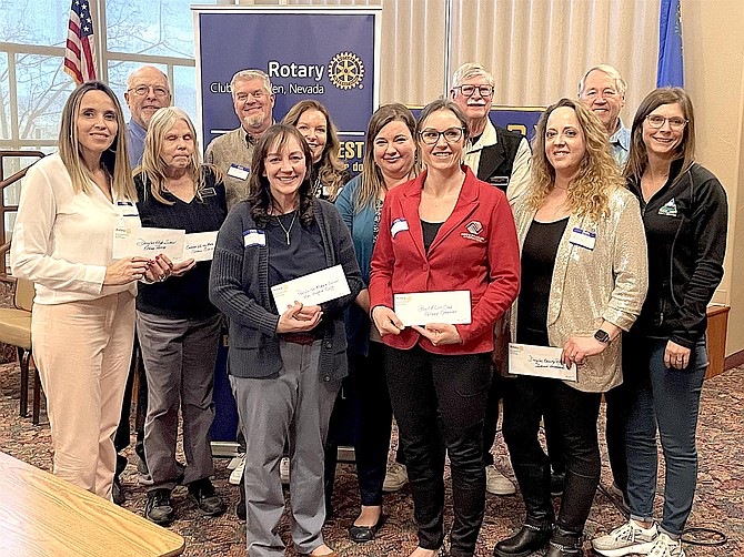 Recipients of checks from Minden Rotary.