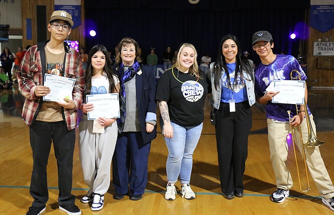 Carson High School sophomore Eduardo Aguilar, freshman Alivia Lindbloom, Mayor Lori Bagwell, School Social Worker Bailee Barber, Attendance Interventionist Brenda Ramirez and senior David Gutierrez-De Jesus gather for a photo at the school’s Winterfest assembly on Jan. 26. Bagwell honored Aguilar, Lindbloom and Gutierrez-De Jesus with Airpods and cash credit cards during her “Mayor’s Attendance Hall of Fame” campaign to promote perfect, improved or consistent attendance in school.