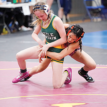 THOMAS RANSON • Nevada News Group
Battle Mountain's Dani Madalena wrestles at the Girls Northern Regional Championship at McQueen High School on Saturday.