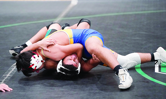 The Lowry wrestling team finished second at the Northern 3A duals in Fallon, losing only to Elko.