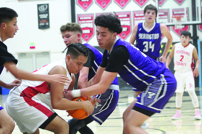 Amare Rosas takes possession of the ball at Tuesday's game hosted by Pershing County.