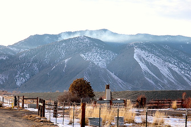 Smoke from prescribed burns rises over Kingsbury Grade on Monday afternoon.