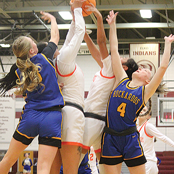 Lowry’s Bryce Brinkerhoff and Cambira Tisue (4) fight for a rebound.