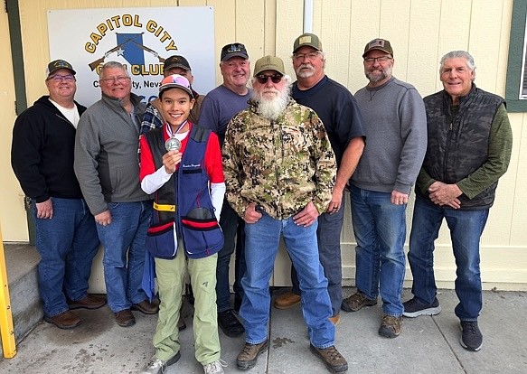 Branden Fitzgerald with the Capital City Gun Club board.