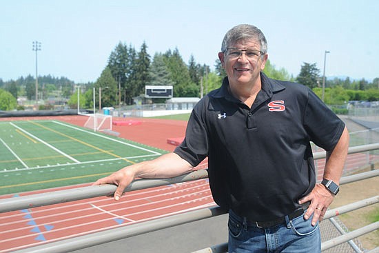 Snohomish High School Athletic Director Mark Perry, stands before the athletic field at Snohomish Veterans Memorial Stadium on May 17.
