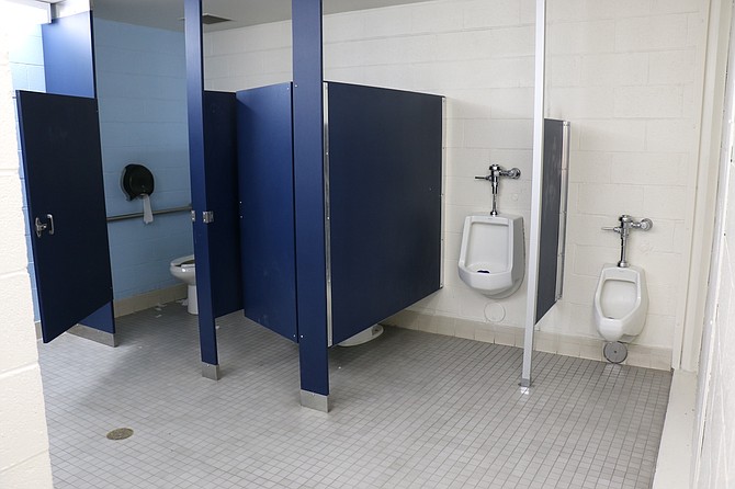 Carson High School’s student restrooms will be remodeled this year, converted from a gendered layout to an open, walk-in style. The remodel applies to all four restroom blocks, including this men’s restroom on the upper floor at the south end of the school.