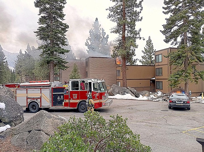 Tahoe Douglas firefighters arrive at a structure fire on Holly Lane in Lake View on Monday morning.