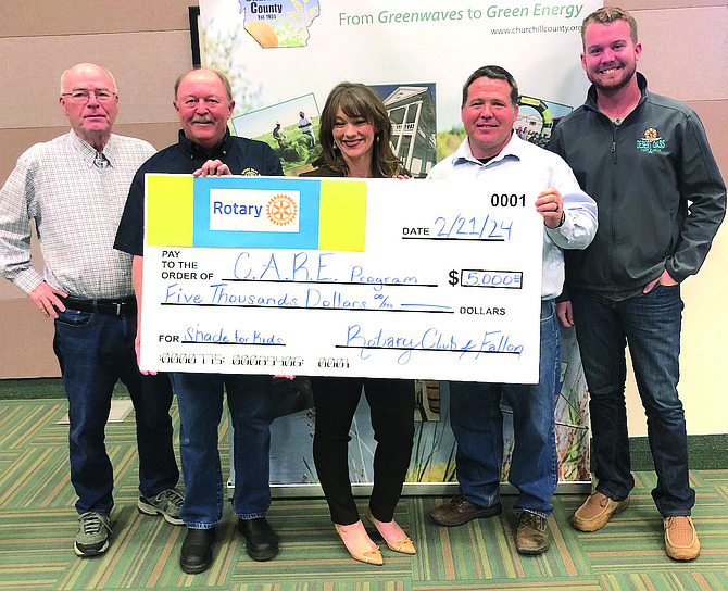 The Churchill commission accepts a $5,000 donation from the Fallon Rotary Club to support a shade structure to be erected at the Cottage Schools where the county’s CARE and SUMFUN programs are housed. From left are Commissioner Bus Scharman, Rotary members Darryl Hook and Chelsea Sanford, and Commissioners Justin Heath and Myles Getto.