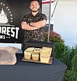 Nathanael Engen displays his stand. He will soon be debuting his variety of home-grown gourmet mushrooms at the Snohomish Farmers Market.