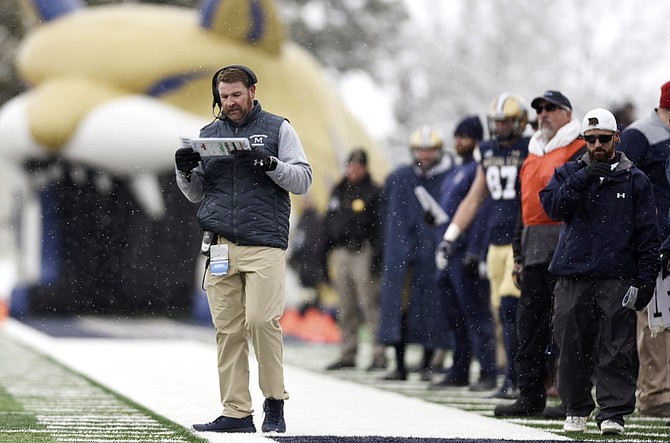 Nevada head coach Jeff Choate, shown leading Montana State during an FCS playoff game, is scheduled to make his Wolf Pack debut on Aug. 24 against SMU.