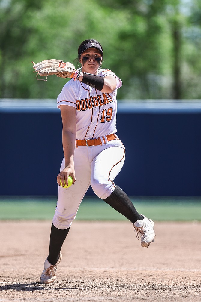 Talia Tretton, the returning Class 5A North Player of the Year, hurls a pitch last season in the state tournament. Tretton, an Iowa signee, will be the main pitcher in the circle for the Tigers this season.