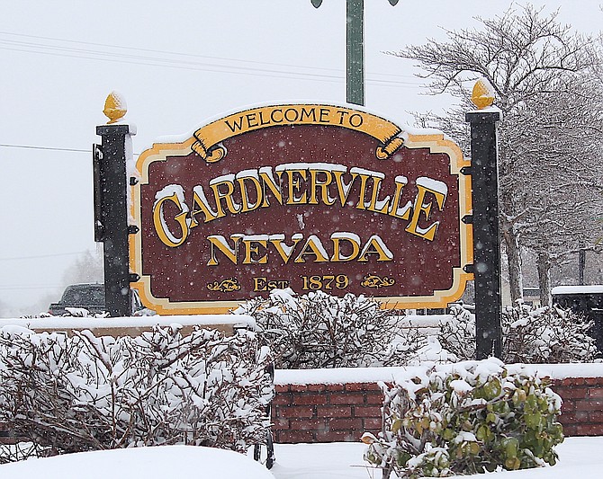 The Welcome to Gardnerville sign got a little extra shading from the snow on Saturday.
