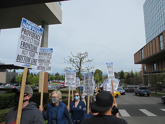 More than 250 people picketed outside Providence Regional Medical Center Everett on May 5.