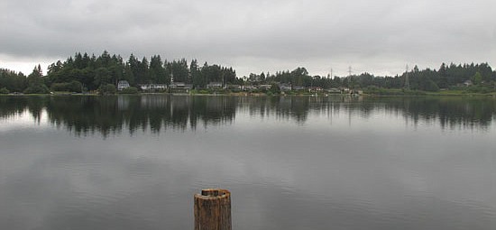 The waters of Blackman Lake as seen on a cloudy day in July.