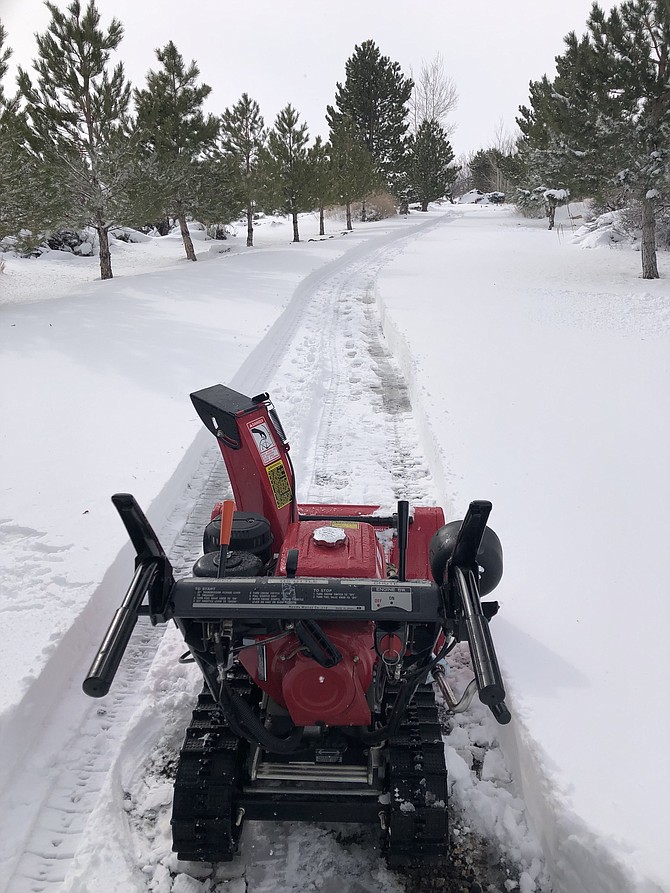 Jeff Garvin broke out the snowblower on Sunday to help clear the 16 inches of snow he received in Fredericksburg.