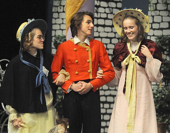 From left, Snohomish High School sophomores Grace Coman (playing Catherine “Kitty” Bennet), Logan Ferguson (as Wickham) and Neenah Voss (as Lydia Bennet) perform during the Saturday, Nov. 27 afternoon performance of “Pride and Prejudice.”