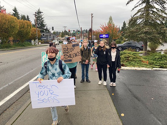 Students marched through town, ending in front of Snohomish High School’s driveway during the start of school Friday, Oct. 22.