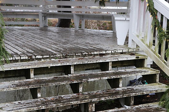 A close-up photo of the First Street Gazebo stairs shows a glimpse of the wear sustained throughout the years.