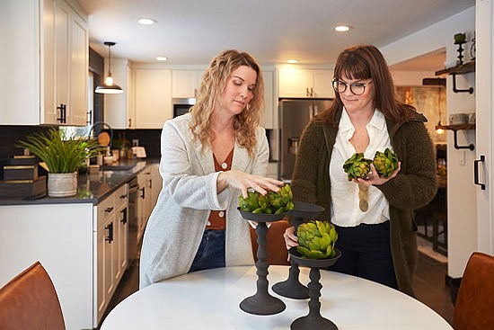 Leslie Davis (left) and Lyndsay Lamb, twin sisters from Snohomish, star in a cable TV show that has been picked up for a second season.