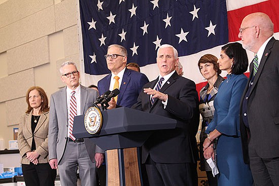 Vice President Mike Pence came to Washington state on Thursday, March 5 to discuss the state response to COVID-19’s spread. To his left is Gov. Jay Inslee.