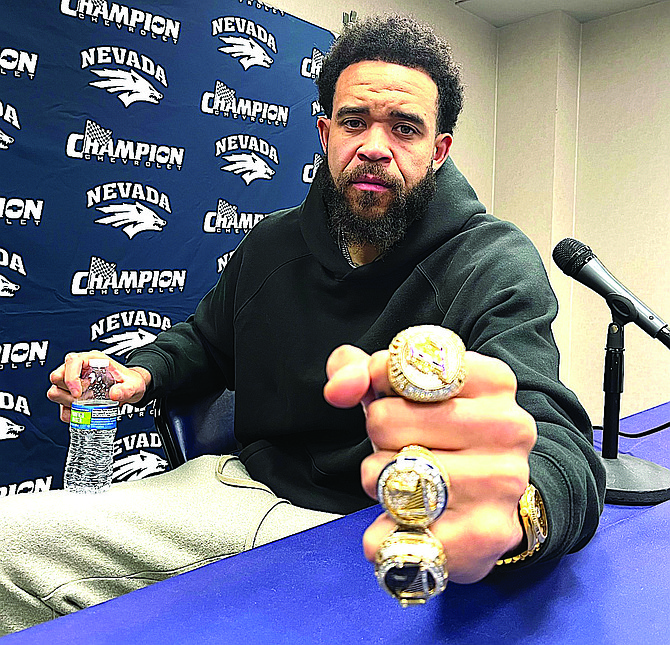 Former Wolf Pack player JaVale McGee shows his three NBA championship rings after a news conference Saturday prior to the Nevada-UNLV basketball game at Lawlor Events Center.
