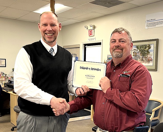 The Gardnerville Town Board honored Geoff Lacost for serving 10 years at its meeting at the beginning of the month. Geoff is a certified arborist in addition to his other duties and coordinates the annual Arbor Day celebration.